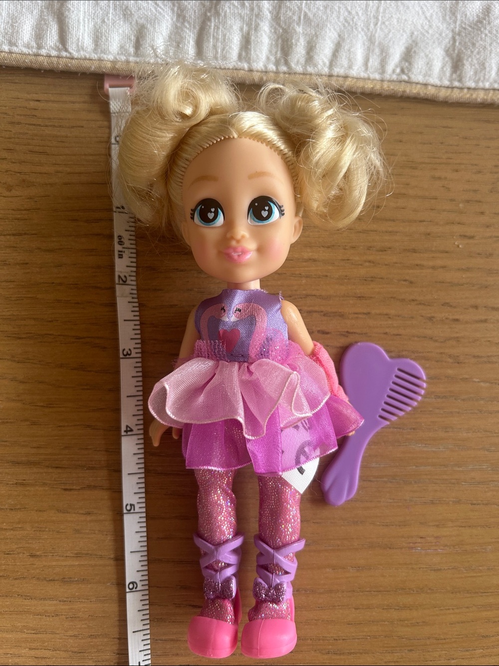 Diana doll with purple comb